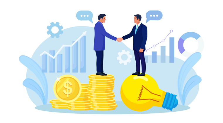 Two men shake hands, one of them standing on a stack of coins and the other on a lightbulb