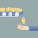 A conveyor belt with coins drops a coin into an extended hand, representing the payouts in an earnout.