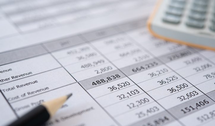 A photo of numbers on a page representing financial reporting in due diligence.